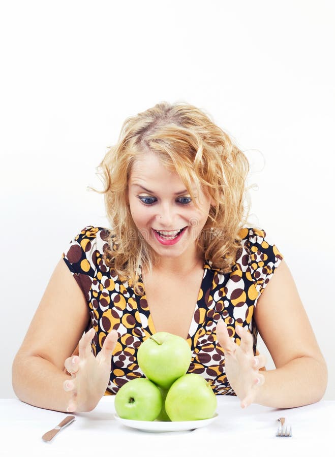 Young cute girl with green apples. Young cute girl with green apples.