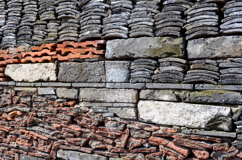 The details of outer wall of Ningbo Museum which made of old tiles, recycled stone and bricks. The details of outer wall of Ningbo Museum which made of old tiles, recycled stone and bricks