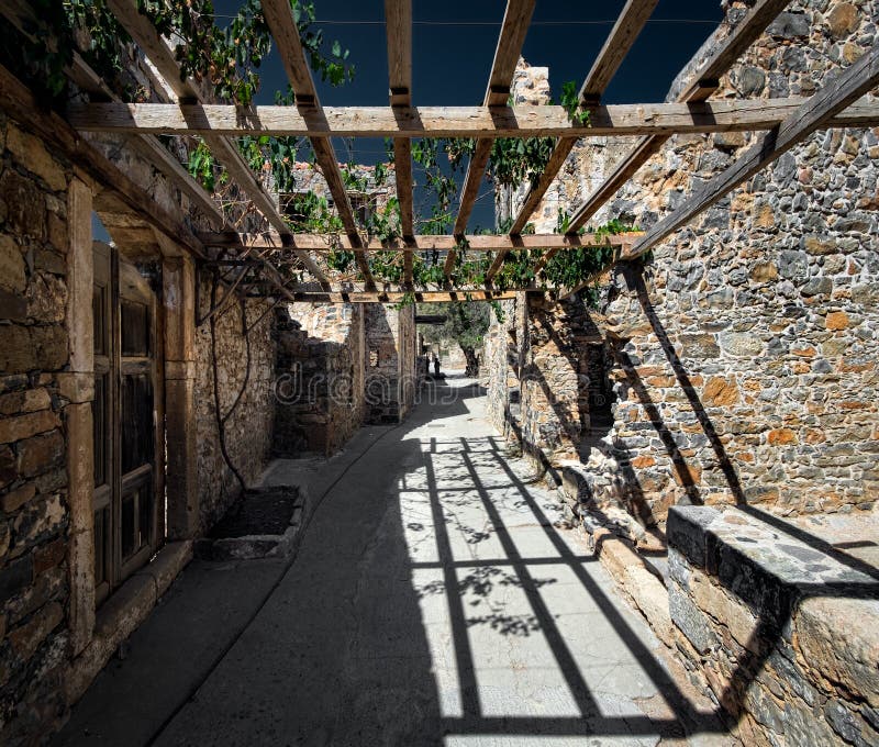 Old walls and pergolas. Greece. Crete. Walking on the rocky island of Spinolong. Crete. Greece. Old walls and pergolas. Greece. Crete. Walking on the rocky island of Spinolong. Crete. Greece.