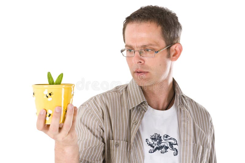 Staring at a Plant stock image. Image of looking, pose 5916611