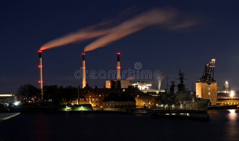 Thick smoke coming out of factory chimney in the night. Thick smoke coming out of factory chimney in the night