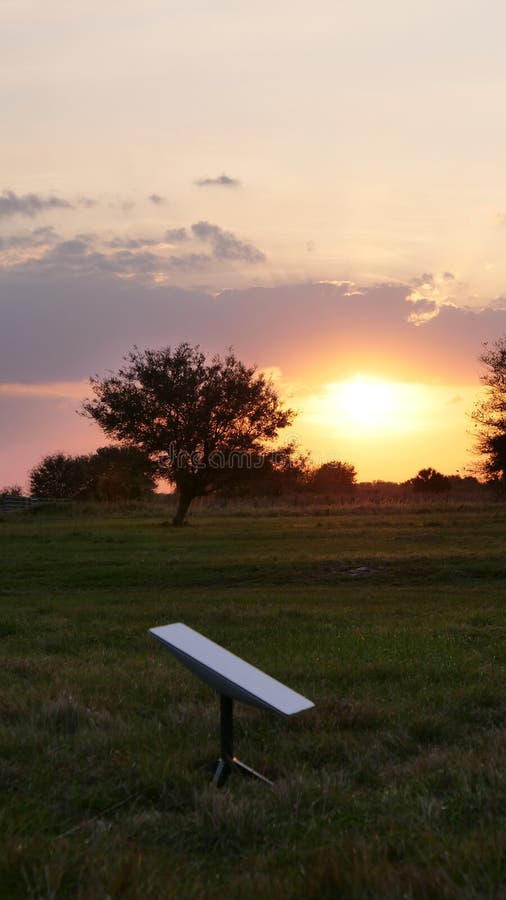 Starlink Antenna and Sunset. Elon Musk Spacex Stock Photo - Image of