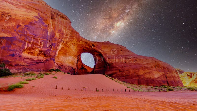 Starry Sky behind the Ear of The Wind, a hole in a rock formation in Monument Valley