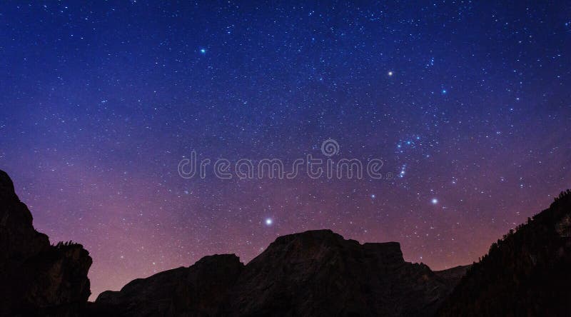 Starry sky over the Alps at night, Italy