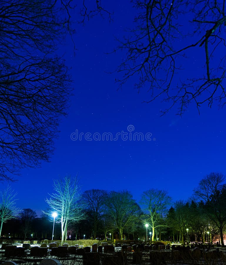 Stars Over a Dark Graveyard.. Stock Photo Image of light, space 267707724