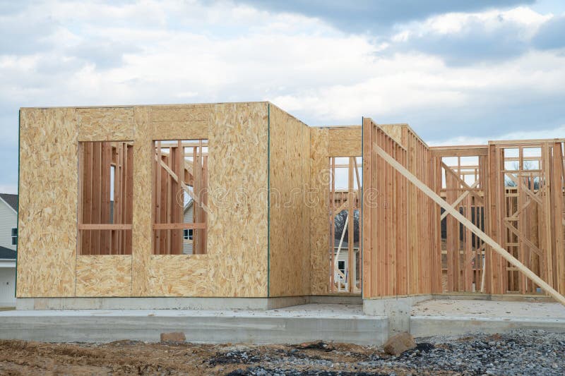 Start of Construction of a Plywood House New Wall Material Stock Image