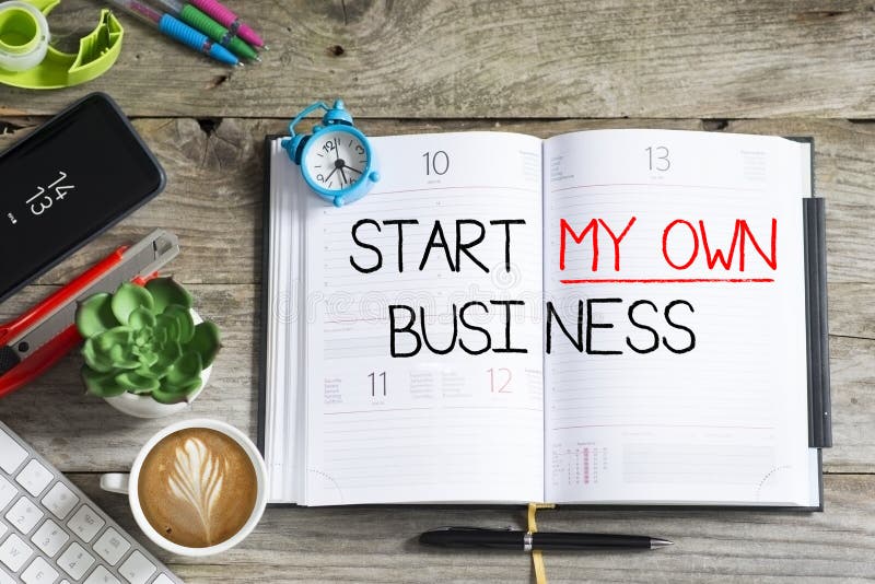 Start my own business question, conceptual image with personal agenda, computer keyboard and office objects on wooden table stock photo Start my own business question, conceptual image with personal agenda, computer keyboard and office objects on wooden table stock photo