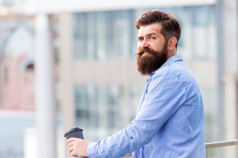 Start up concept. energy charge. Male barber care. copy space. thoughtful man drink take away coffee outdoor. morning royalty free stock photography Start up concept. energy charge. Male barber care. copy space. thoughtful man drink take away coffee outdoor. morning royalty free stock photography