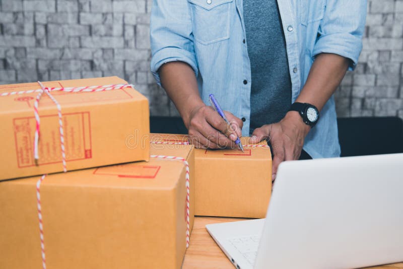 Start up small business entrepreneur SME or freelance asian man working with box at home concept, Young Asian small business owner stock photos Start up small business entrepreneur SME or freelance asian man working with box at home concept, Young Asian small business owner stock photos