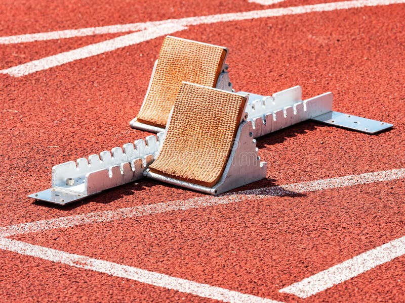 Starting Blocks on Blue Running Tracks Lanes at Track and Field Stadium