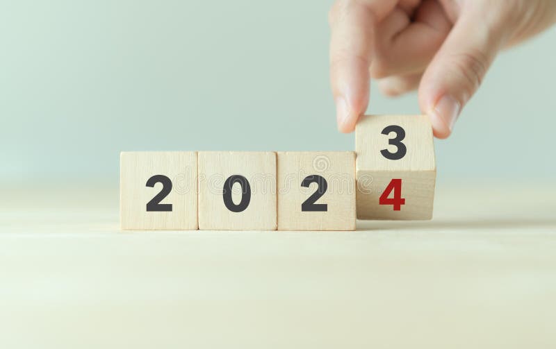 Starting New Year 2024. 2024 on Wooden Cube Blocks. Stock Photo Image