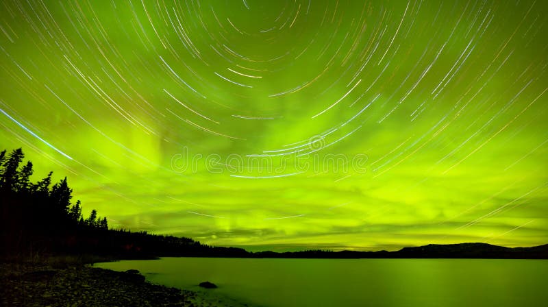 Startrails Northern Lights show over Lake Laberge royalty free stock photos Startrails Northern Lights show over Lake Laberge royalty free stock photos