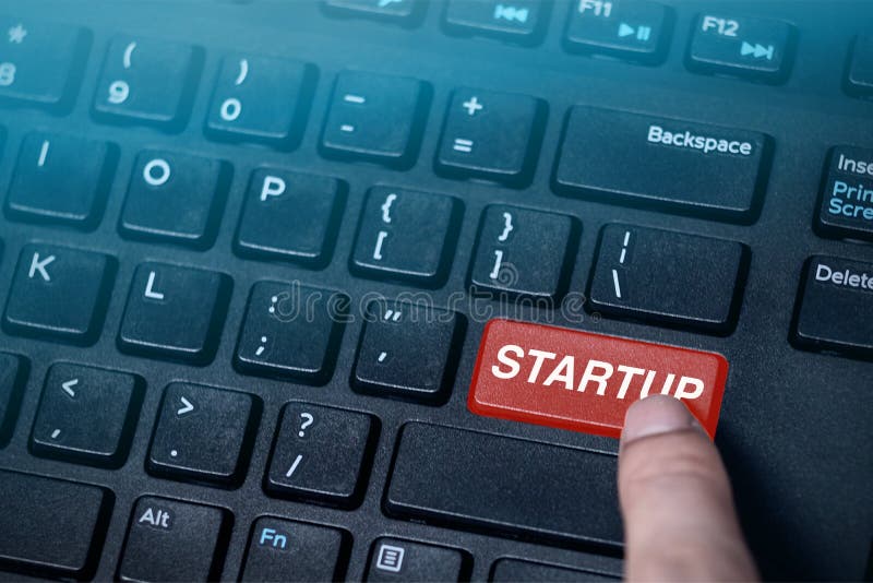 Startup Button On Black Computer Keyboard,startup Background Concept