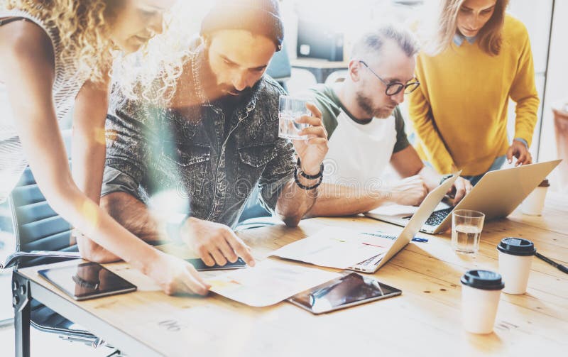 Startup Diversity Teamwork Brainstorming Meeting Concept. Business Team Coworkers Sharing World Economy Report Document royalty free stock photo