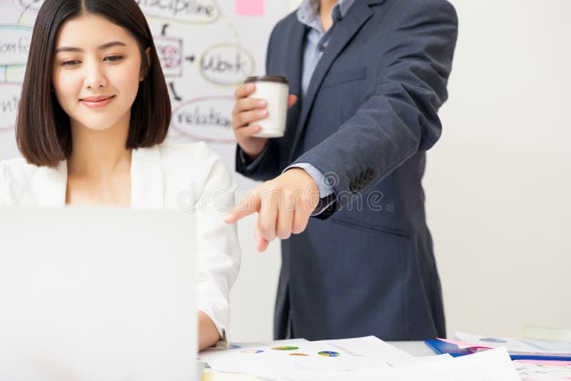 Startup diversity teamwork brainstorming meeting concept. Work colleagues sitting at a table discussing paperwork royalty free stock photos Startup diversity teamwork brainstorming meeting concept. Work colleagues sitting at a table discussing paperwork royalty free stock photos