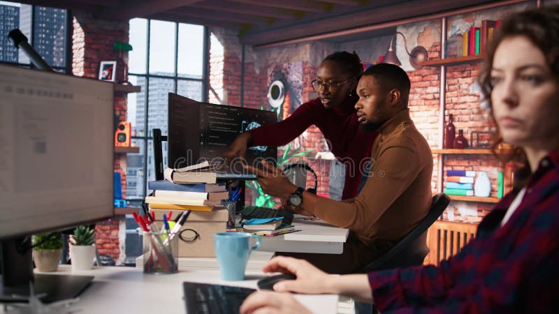 Artificial intelligence startup coworkers doing brainstorming, optimizing code stock video