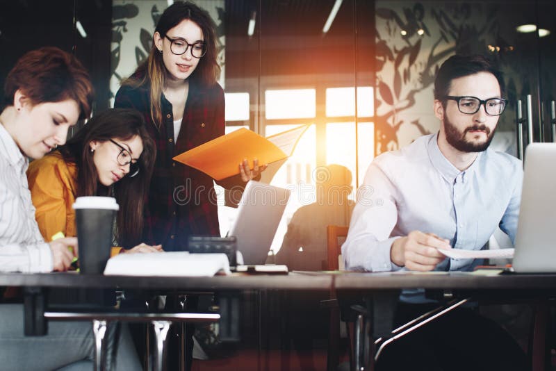 Startup team working with digital project in modern loft space. royalty free stock photography Startup team working with digital project in modern loft space. royalty free stock photography