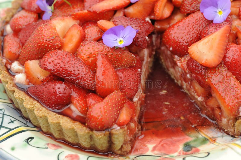 Starwberry tart with slice removed