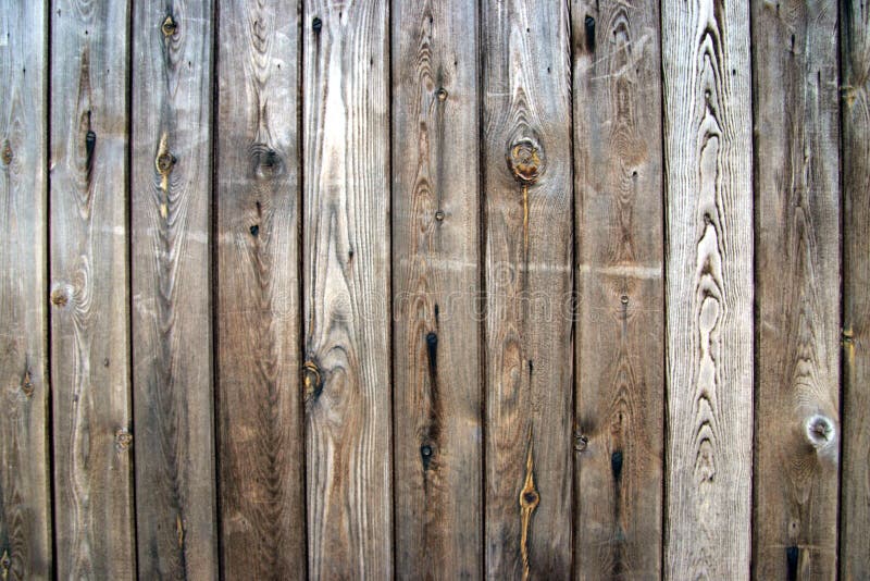 Old weathered wooden door detail. Old weathered wooden door detail