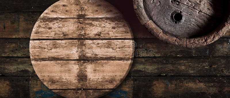 Old oak beer or wine barrel background in a brewery, winery or tavern with aged rustic oak barrels in a wide angle format for concepts such as the Munich Oktoberfest. Old oak beer or wine barrel background in a brewery, winery or tavern with aged rustic oak barrels in a wide angle format for concepts such as the Munich Oktoberfest