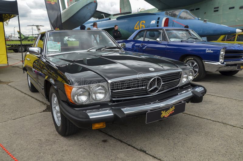 The old elegant model of Mercedes-Benz 1979 450SL 2 doors sedan with V8 engine and automatic gearbox at retro car exhibition. The old elegant model of Mercedes-Benz 1979 450SL 2 doors sedan with V8 engine and automatic gearbox at retro car exhibition
