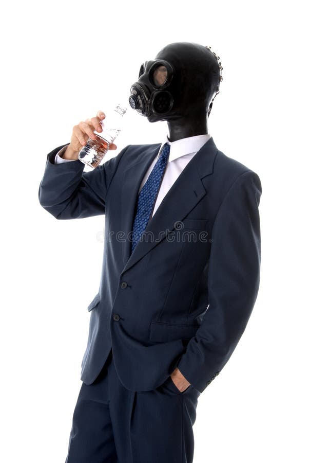Man in blue suit with mask drinking. Man in blue suit with mask drinking