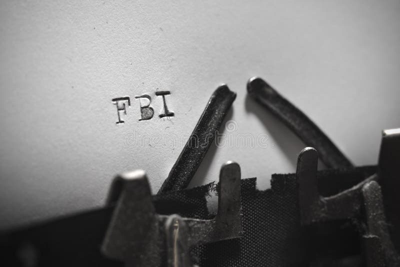 Old retro typewriter with the written text FBI. Old retro typewriter with the written text FBI