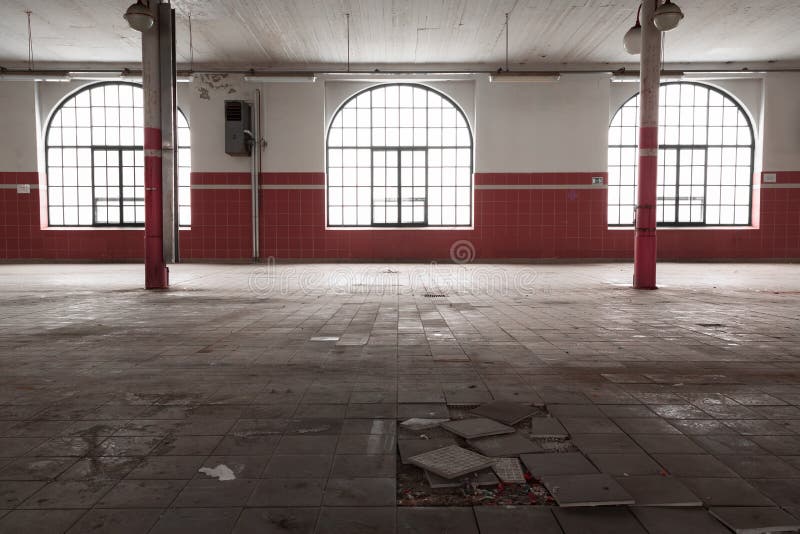 An empty industrial warehouse interior, old beer house. An empty industrial warehouse interior, old beer house