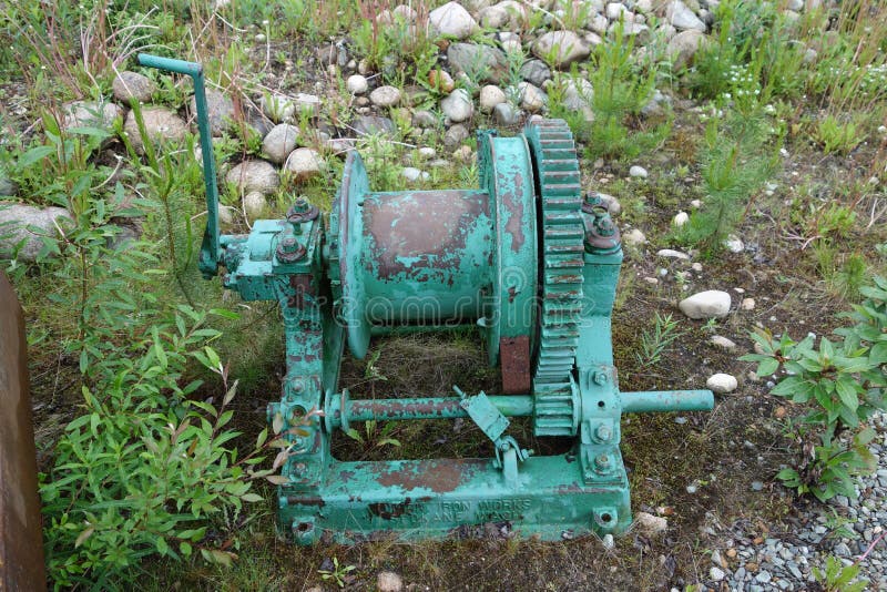 An antique hand-cranked winch used in the mining industry at jade city. An antique hand-cranked winch used in the mining industry at jade city.