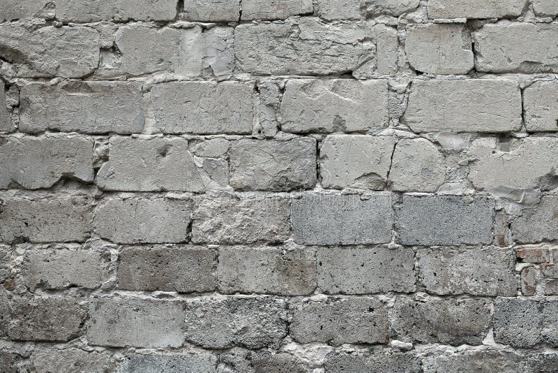 Old broken gray brick wall background. Old gray damaged brick wall texture, Gray brick backdrop and texture for text or image. Gray background for design, design and template. Old broken gray brick wall background. Old gray damaged brick wall texture, Gray brick backdrop and texture for text or image. Gray background for design, design and template.