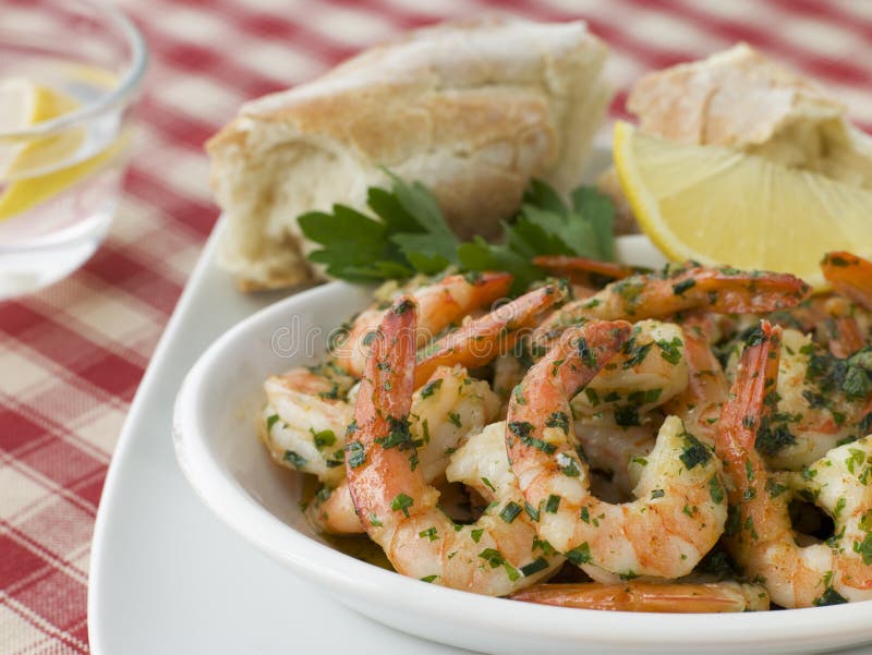 Dish of Garlic Buttered Tiger Prawns with Rustic Bread. Dish of Garlic Buttered Tiger Prawns with Rustic Bread