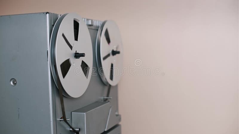 Vintage Reel-to-Reel Player with Spinning Spools stock footage