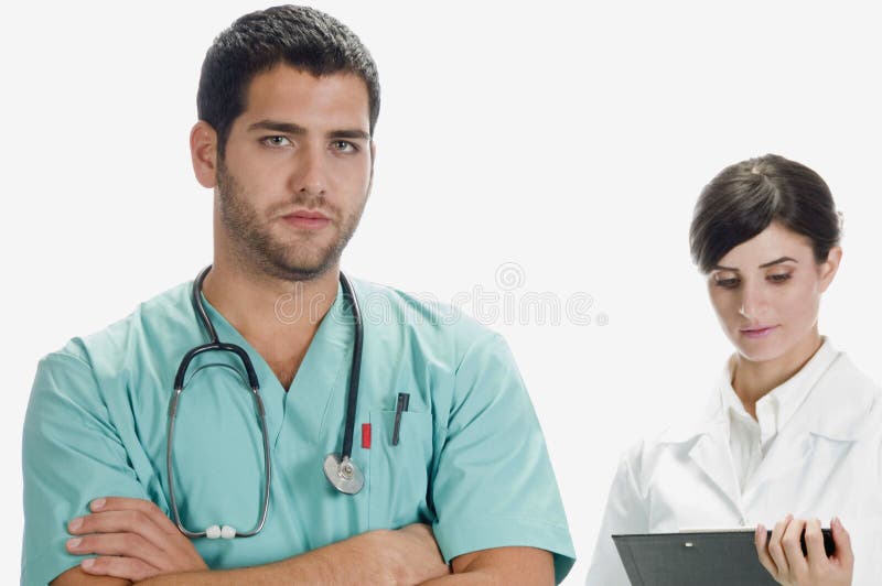 Stattlicher Doktor und hübsche Krankenschwester stockfoto Stattlicher Doktor und hübsche Krankenschwester stockfoto