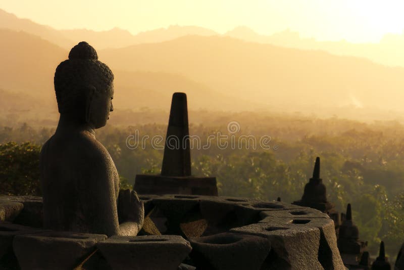Statua in Borobudur, Java, Indonesia del Buddha immagini stock Statua in Borobudur, Java, Indonesia del Buddha immagini stock