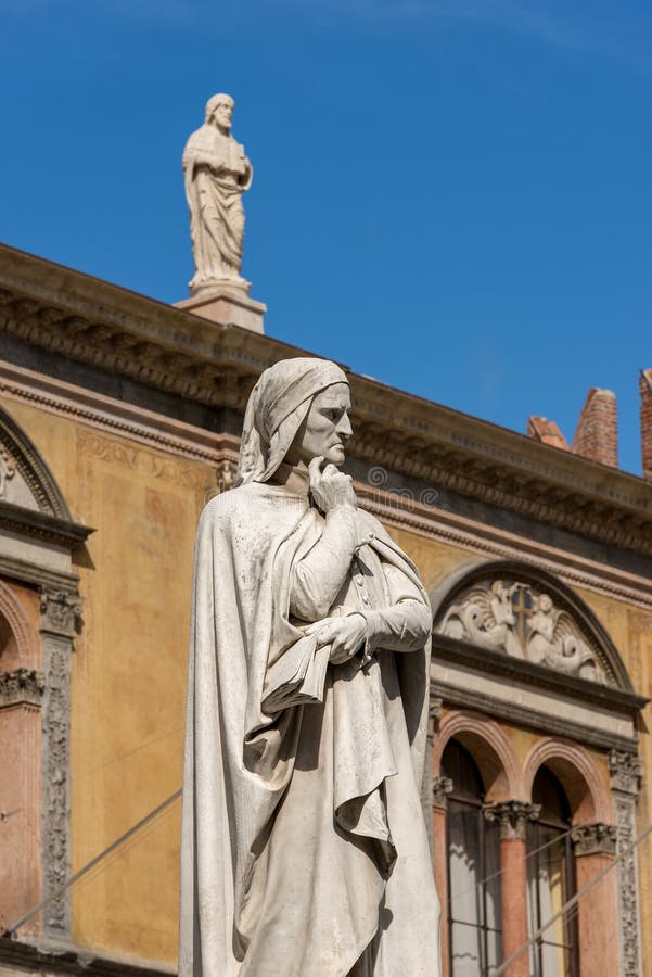 Close-up of the Dante Alighieri statue in Piazza dei Signori in Verona UNESCO world heritage site - Veneto, Italy, Europe. Close-up of the Dante Alighieri statue in Piazza dei Signori in Verona UNESCO world heritage site - Veneto, Italy, Europe