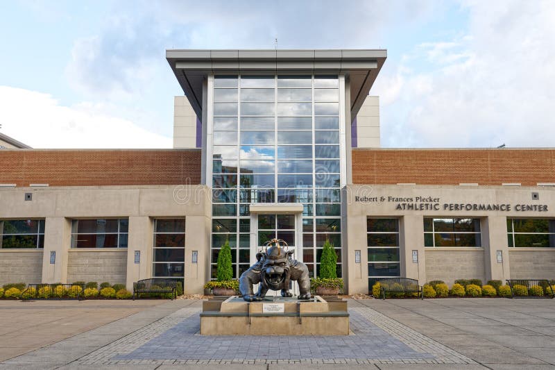 Harrisonburg, Virginia - Oct. 21, 2023: Duke Dog Statue, by Lee Leuning, in front of the Robert and Francis Plecker Athletic Performance Center on the James Madison University campus. Harrisonburg, Virginia - Oct. 21, 2023: Duke Dog Statue, by Lee Leuning, in front of the Robert and Francis Plecker Athletic Performance Center on the James Madison University campus