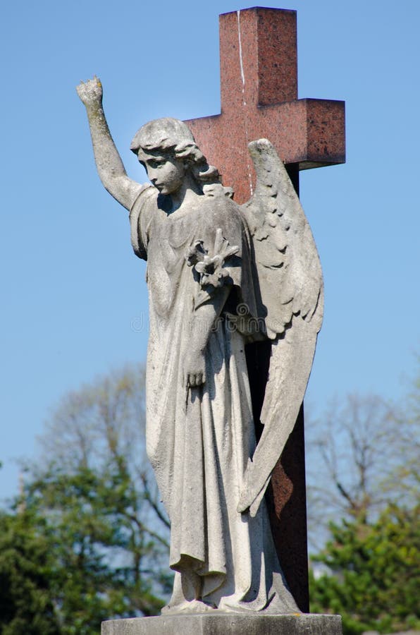 Statue of Angel on cross stock photo. Image of cross 90478032