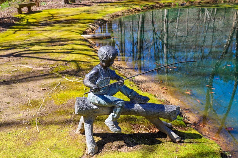 Statue Boy Fishing Stock Photos - Free & Royalty-Free Stock Photos from  Dreamstime