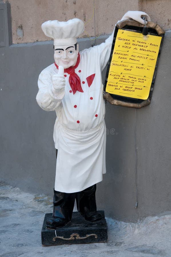 Statue of Chef Holding a Menu of a Restaurant Stock Image Image of