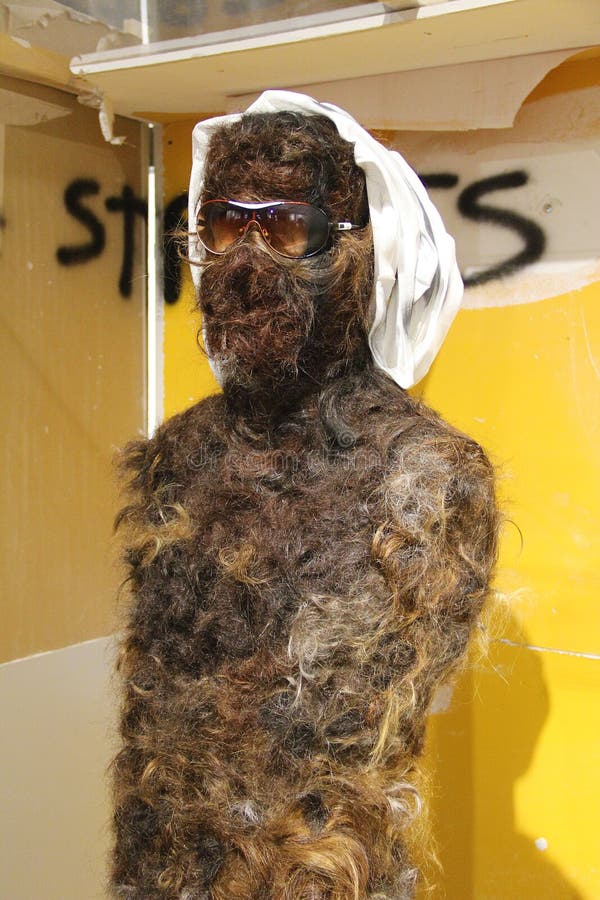 Statue covered in hair