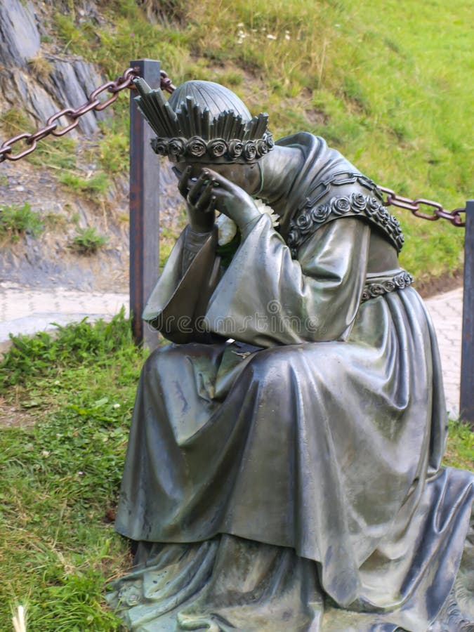 Statue depicting Our Lady of La Salette in a sanctuary in the Alps