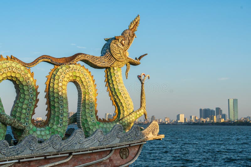 Statue dragon made of porcelain and stone in the West Lake, Hanoi royalty free stock image