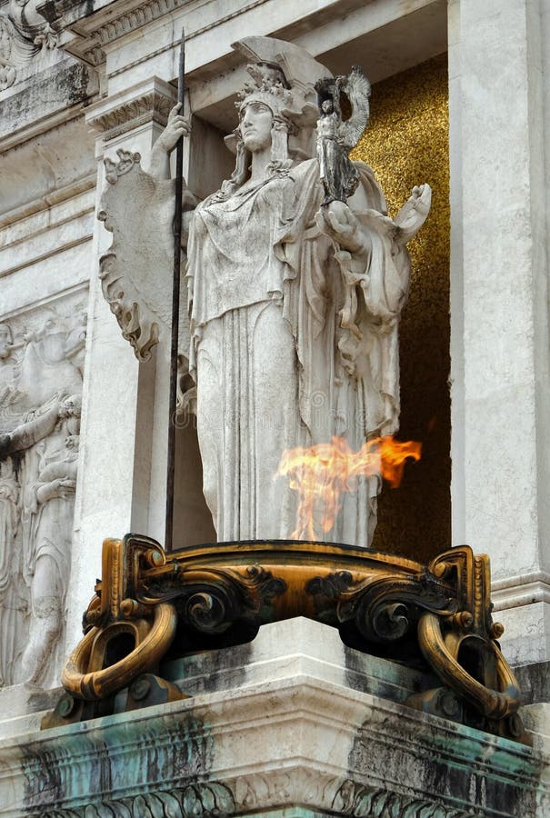 Statue of the goddess Roma. Rome, Italy - May 7, 2018: The statue of the goddess Roma. The fragment of the Tomb of the Unknown Soldier, the Altar of the royalty free stock images Statue of the goddess Roma. Rome, Italy - May 7, 2018: The statue of the goddess Roma. The fragment of the Tomb of the Unknown Soldier, the Altar of the royalty free stock images