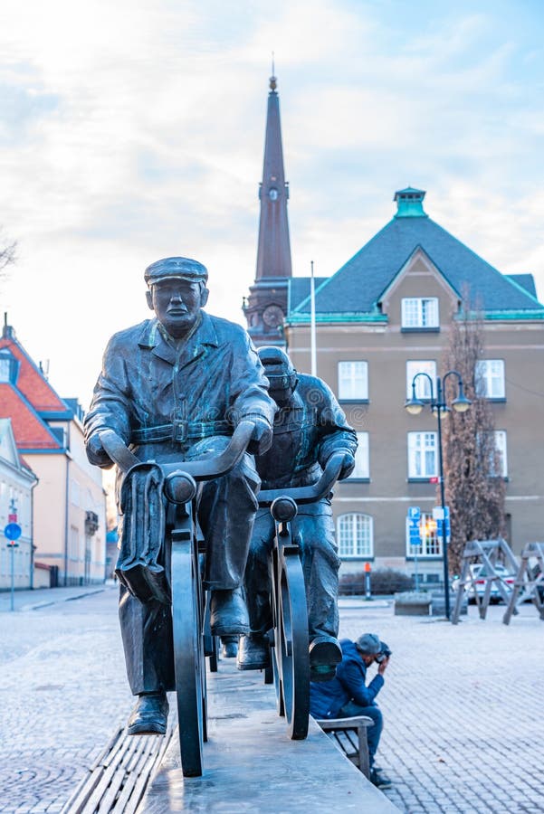 Statue of a group of cyclists on Stora torget square in Vasteras, Sweden