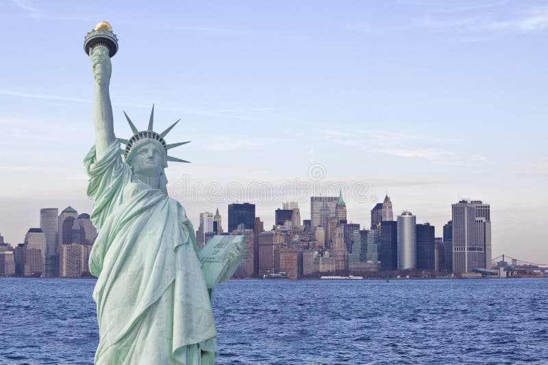 Statue of liberty and new york skyline in back royalty free stock photo Statue of liberty and new york skyline in back royalty free stock photo