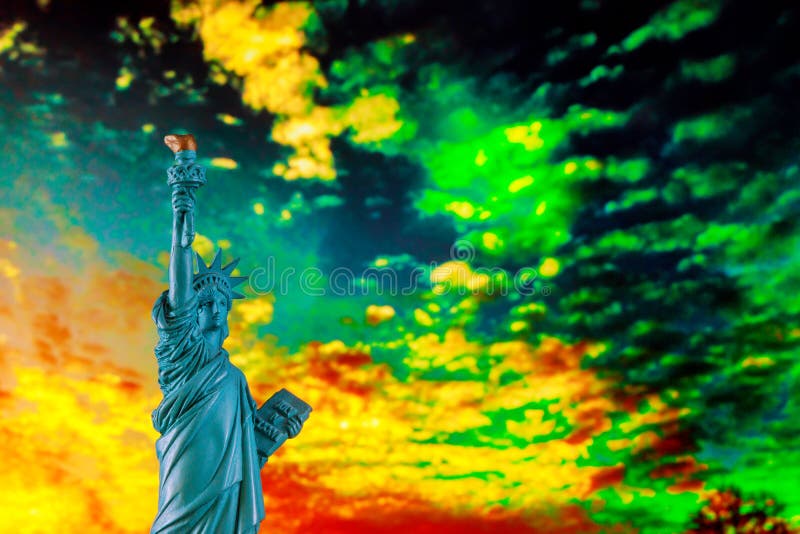 Statue of liberty at sunset with sun and orange sky Symbol US. Statue of liberty at sunset with sun and orange sky American Symbol US, freedom, nyc, independence royalty free stock photos Statue of liberty at sunset with sun and orange sky Symbol US. Statue of liberty at sunset with sun and orange sky American Symbol US, freedom, nyc, independence royalty free stock photos