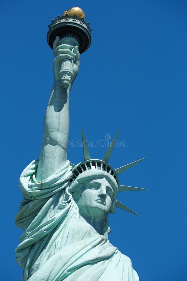 Statue of Liberty with Torch Detail in a Sunny Day in New York Stock ...