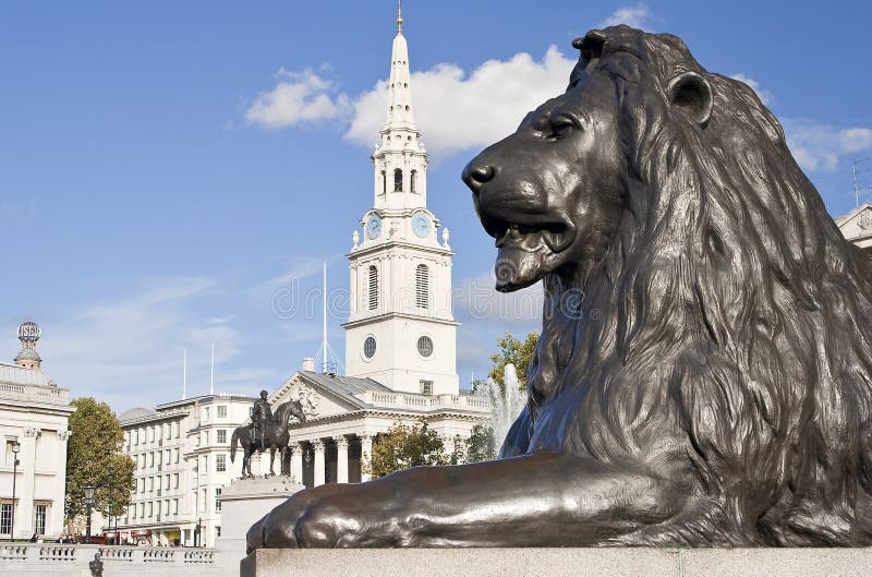 Statue of a lion in Trafalgar Square in London