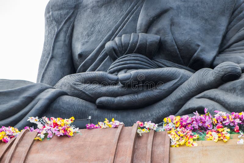 Statue monk buddhist saint sitting with meditation