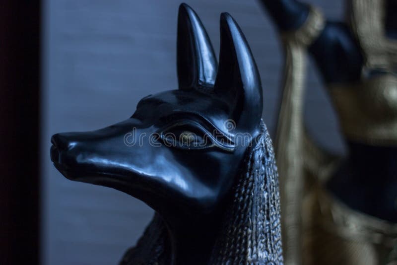 Statue of Mythology Jackal Anubis Sky and Clouds Stock Image